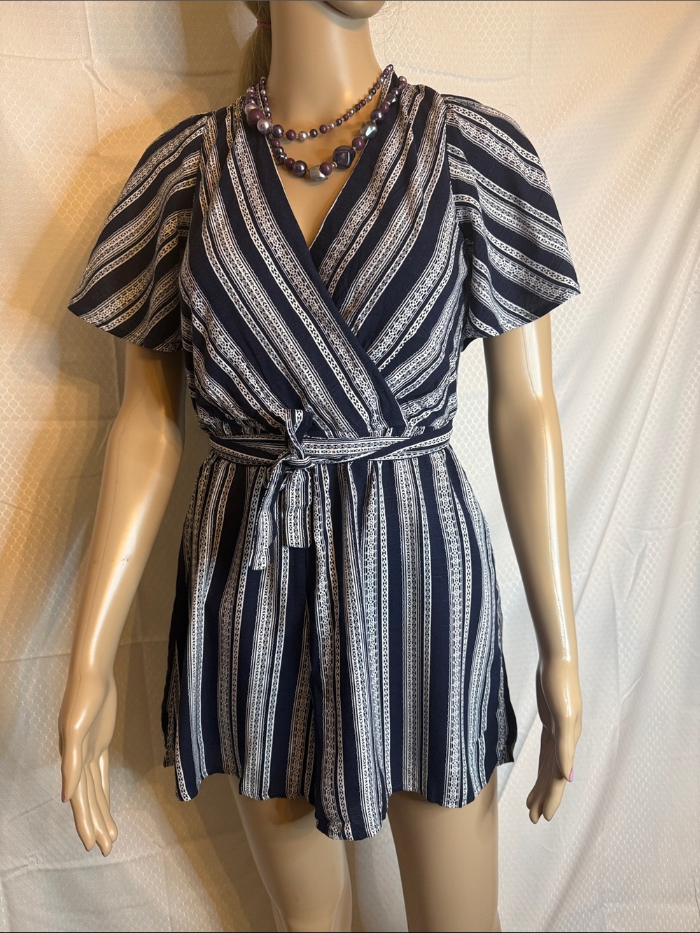 NWT Francesca‘s blue  and white romper with flowy  short sleeves size medium